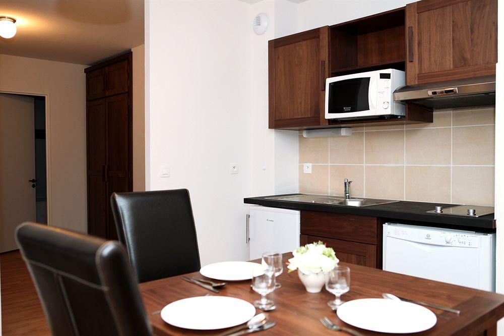 Comfort Aparthotel Lourdes L'Acacia Экстерьер фото